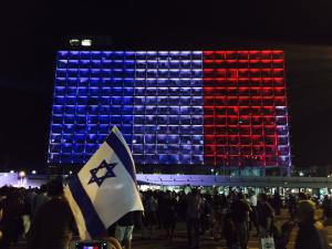 Tel Aviv city hall lit up like the French flag